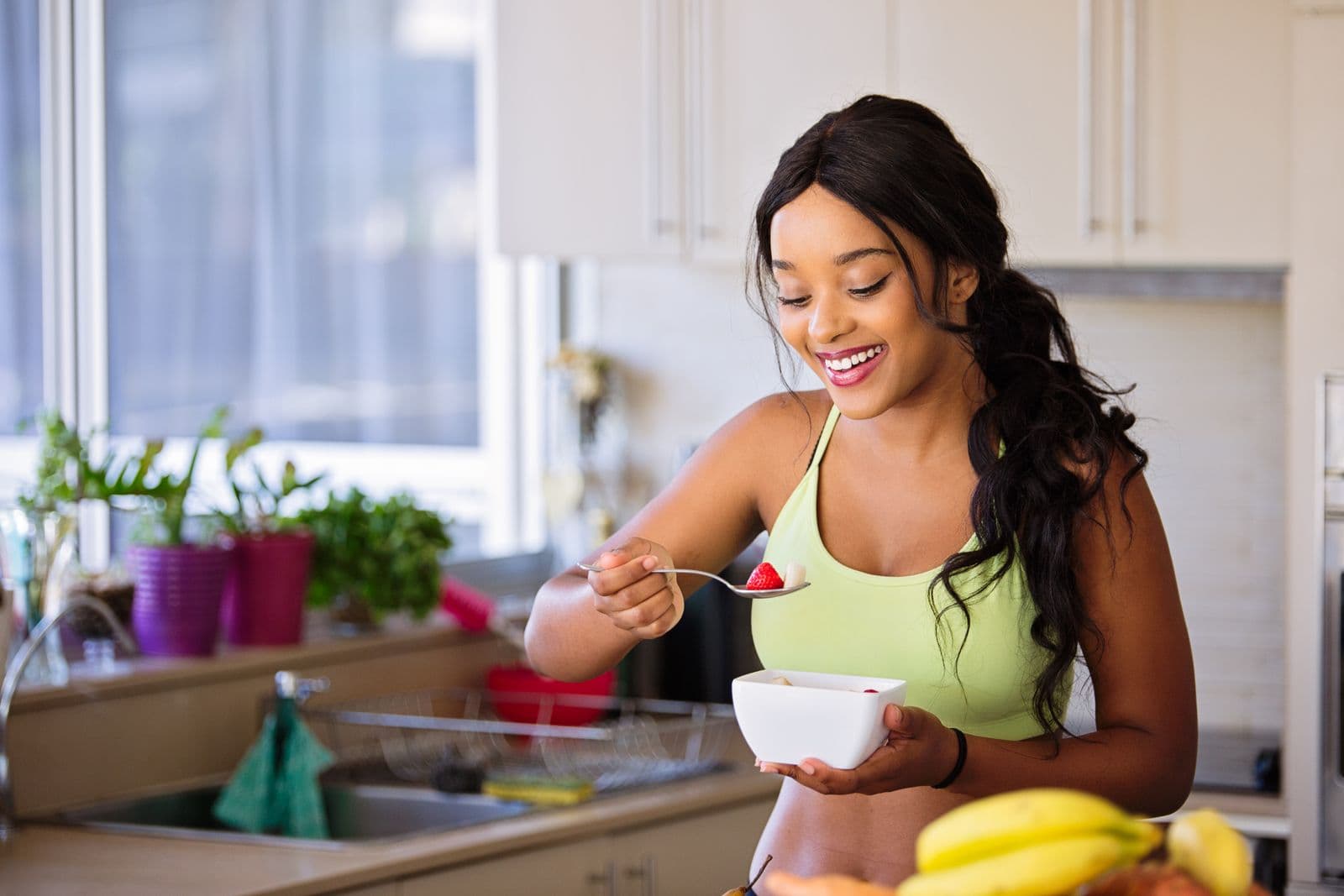 A woman enjoying a healthy meal